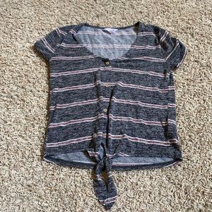 red,white,and dark grey button up short-sleeve shirt